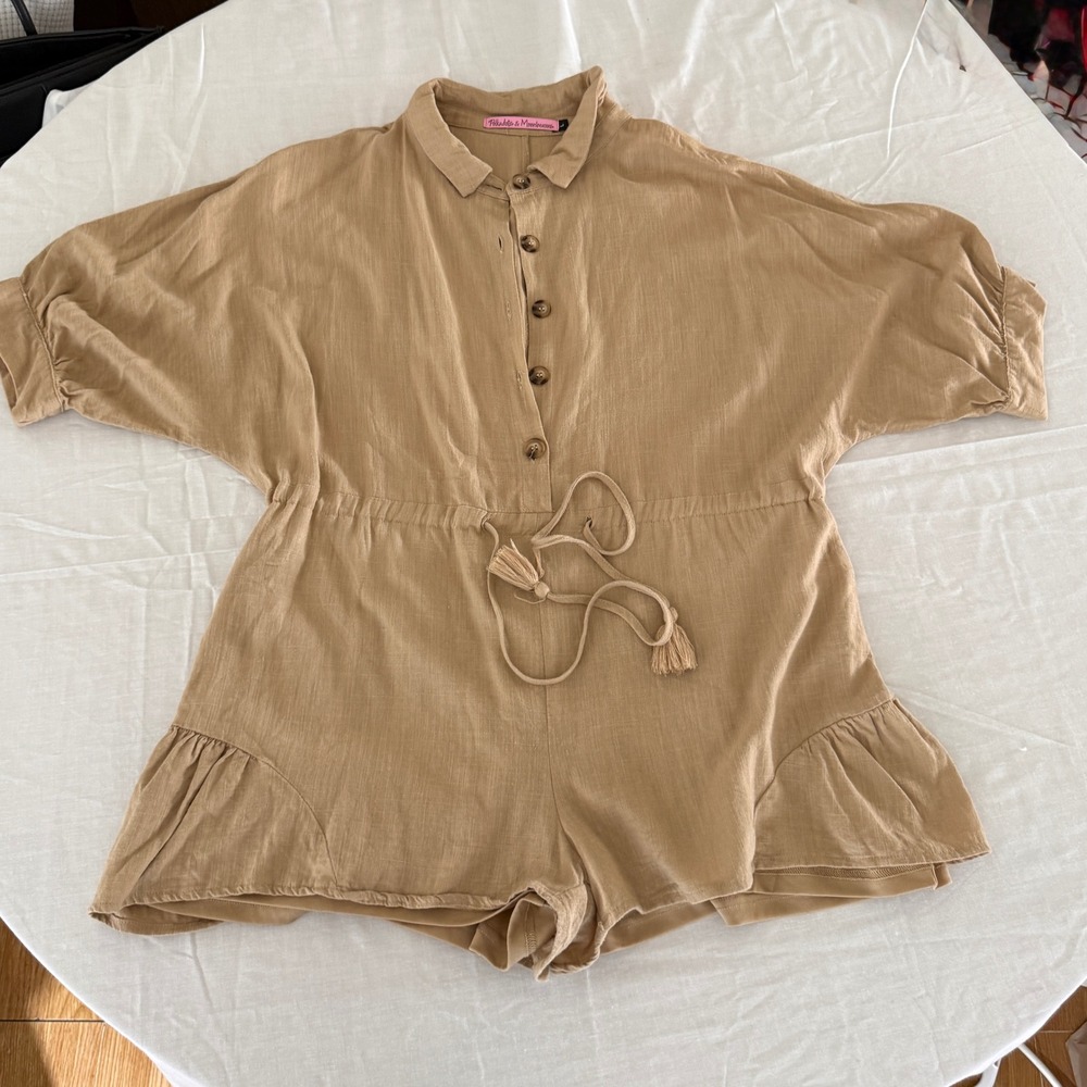 Polkadots & Moonbeams Tan Button Front Tassel Tie Ruffle Hem Romper Large